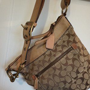 Coach leather trim and insignia bag